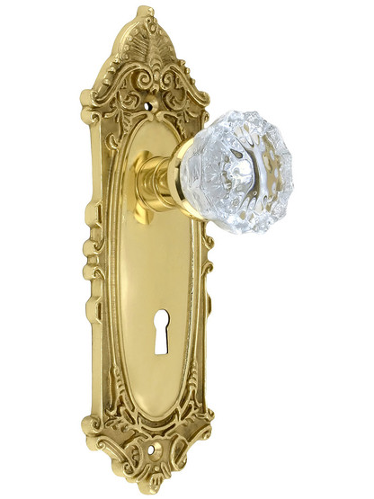 Largo Design Mortise Lock Set With Fluted Crystal Door Knobs in Unlacquered Brass.